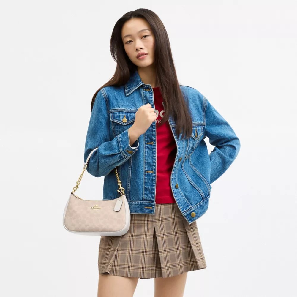 Bolso de hombro Teri en Signature Canvas