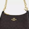 Bolso de hombro Teri en Signature Canvas