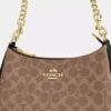 Bolso de hombro Teri en Signature Canvas