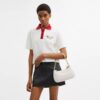 Bolso de hombro Teri en Signature Canvas