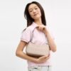 Bolso de hombro Teri en Signature Canvas