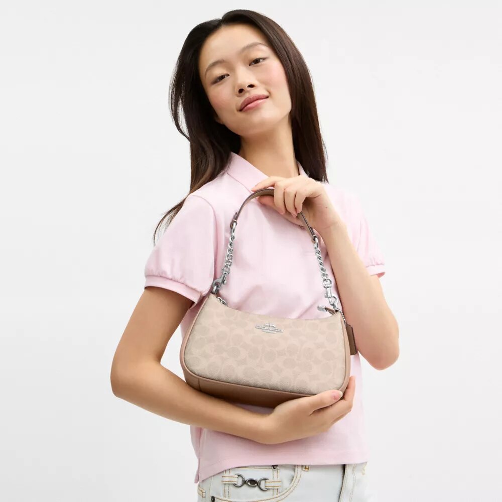 Bolso de hombro Teri en Signature Canvas