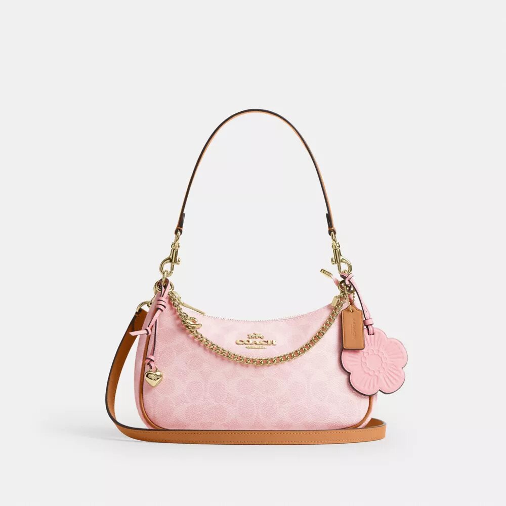 Bolso de hombro Teri en Signature Canvas con Charms