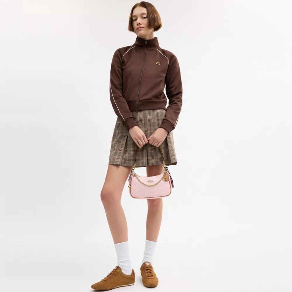 Bolso de hombro Teri en Signature Canvas con Charms