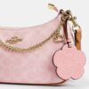 Bolso de hombro Teri en Signature Canvas con Charms