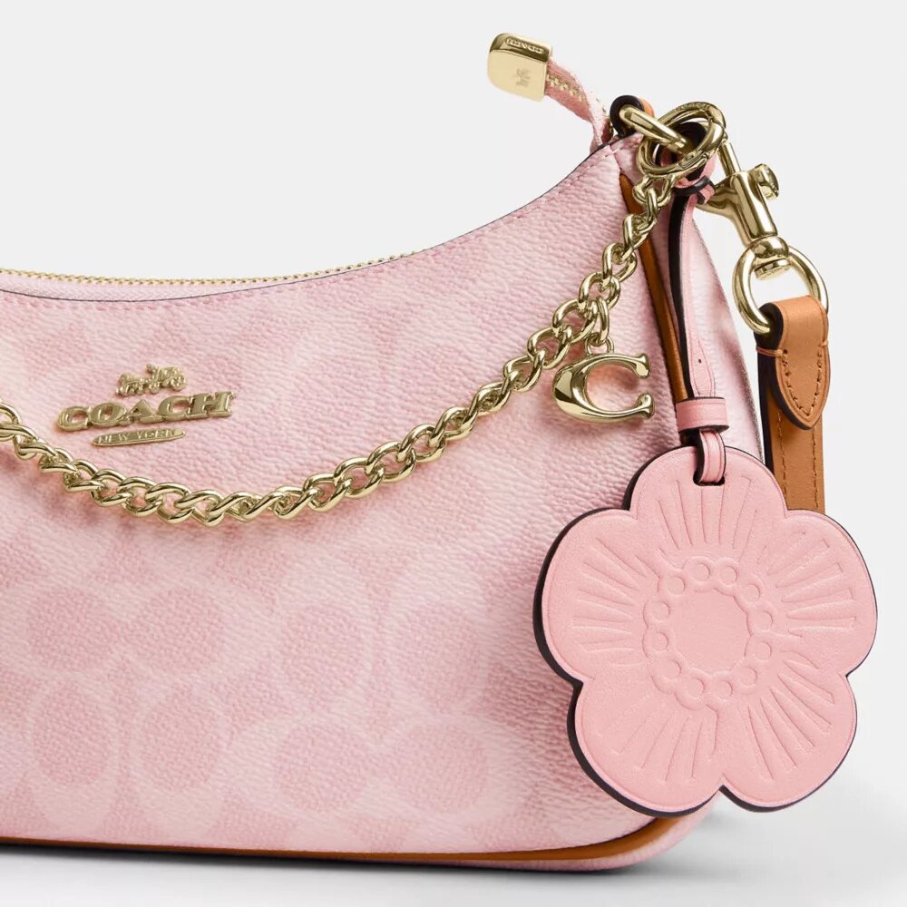 Bolso de hombro Teri en Signature Canvas con Charms
