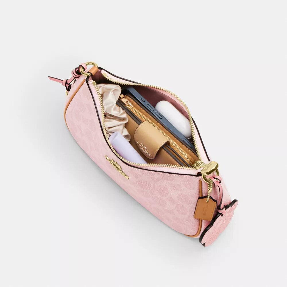 Bolso de hombro Teri en Signature Canvas con Charms