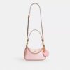 Bolso de hombro Teri en Signature Canvas con Charms