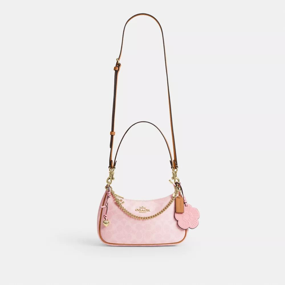 Bolso de hombro Teri en Signature Canvas con Charms