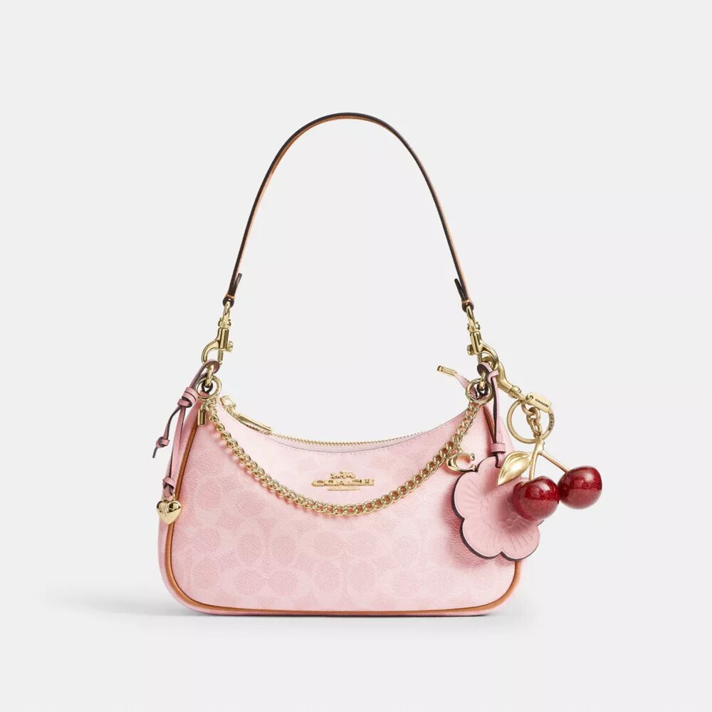 Bolso de hombro Teri en Signature Canvas con Charms