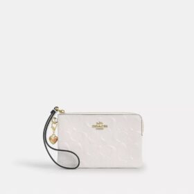 Bolso de pulsera con cremallera en la esquina, en piel exclusiva con Charms en forma de corazón