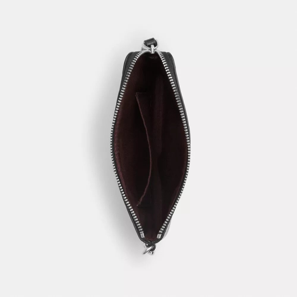 Bolso de pulsera con cremallera en la esquina, en piel exclusiva con Charms en forma de corazón