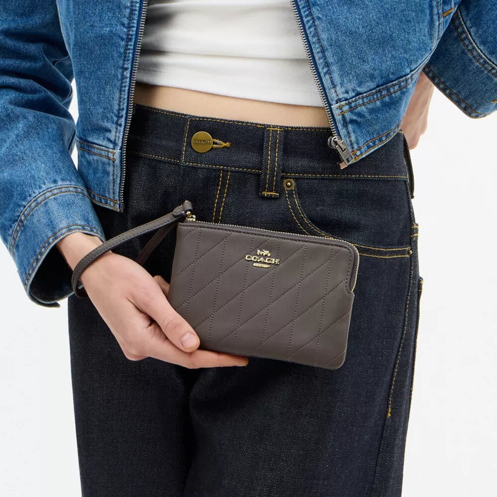 Bolso de pulsera con cremallera en la esquina y acolchado