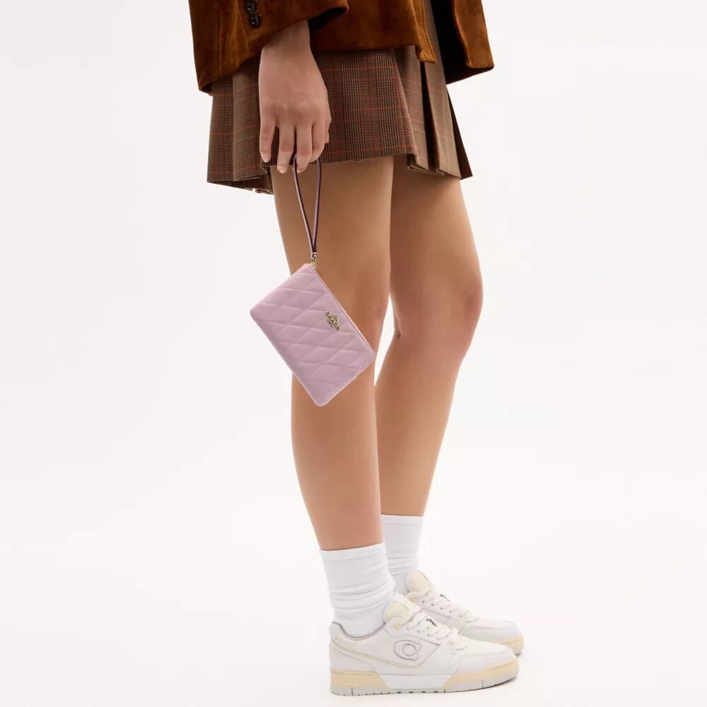Bolso de pulsera con cremallera en la esquina y acolchado