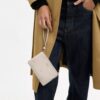 Bolso de pulsera con cremallera en la esquina y estampado de estrellas