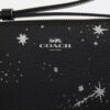 Bolso de pulsera con cremallera en la esquina y estampado de estrellas