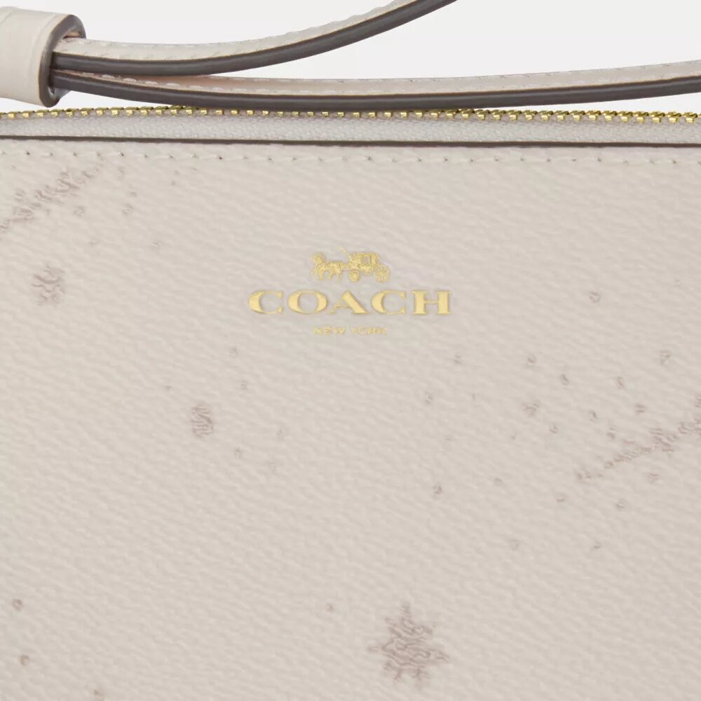 Bolso de pulsera con cremallera en la esquina y estampado de estrellas