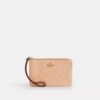 Bolso de pulsera con cremallera en las esquinas de piel exclusiva
