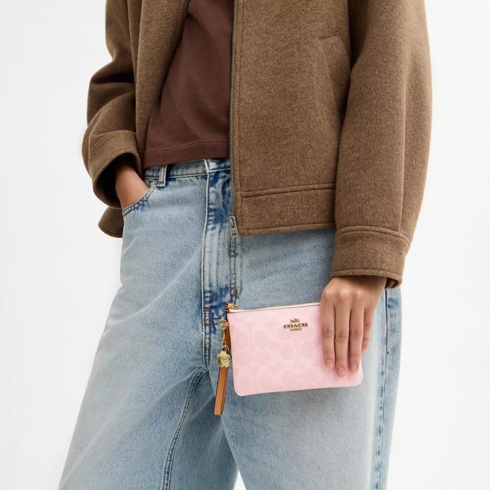 Bolso de pulsera con cremallera en las esquinas, de Signature Canvas con Charms