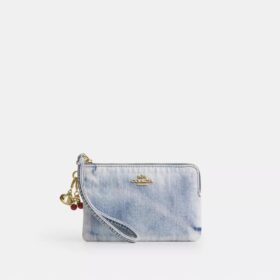 Bolso de pulsera con cremallera en las esquinas, en denim desgastado con Charms