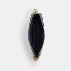 Bolso de pulsera con cremallera en las esquinas, en denim desgastado con Charms