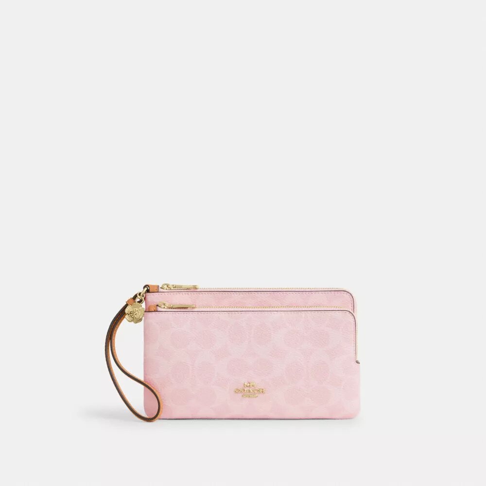 Bolso de pulsera con doble cremallera en Signature Canvas con Charms