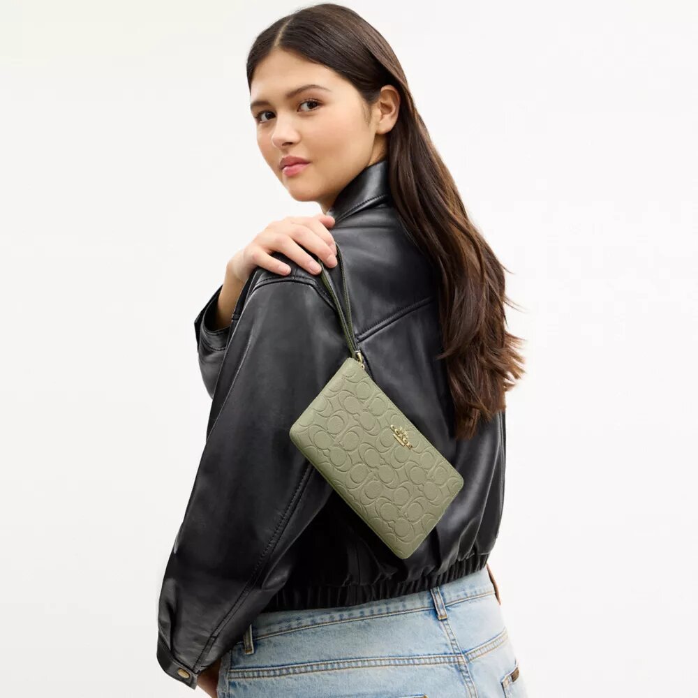 Bolso de pulsera grande con cremallera en la esquina, en piel exclusiva