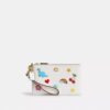 Bolso de pulsera pequeño «Essential» con estampado de pegatinas