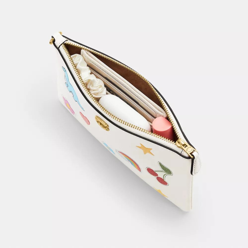 Bolso de pulsera pequeño «Essential» con estampado de pegatinas