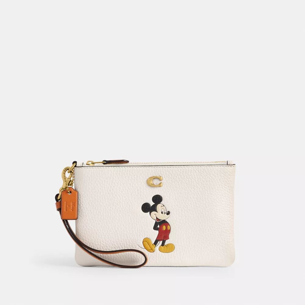 Bolso de pulsera pequeño Essential de Disney x Coach en piel regenerativa con Mickey Mouse