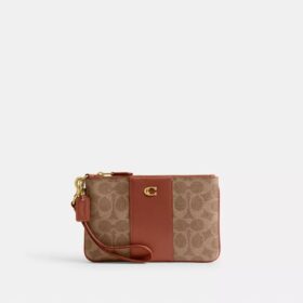 Bolso de pulsera pequeño Essential en Signature Canvas