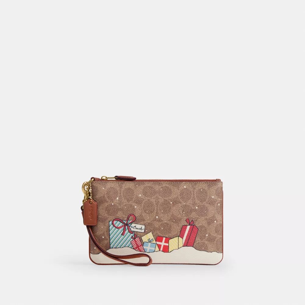 Bolso de pulsera pequeño «Essential» en Signature Canvas con regalos navideños