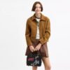 Bolso Disney X Coach Rogue 25 con Pluto