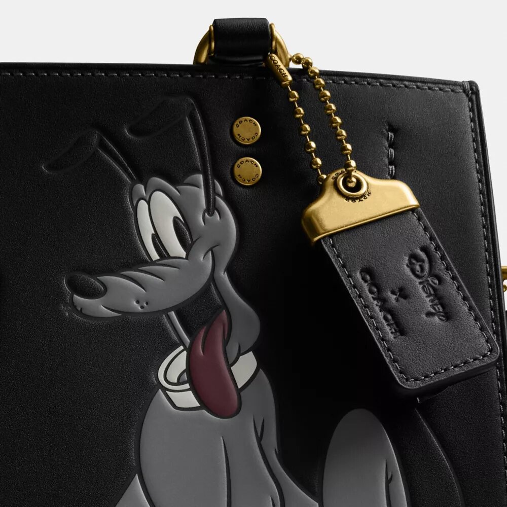 Bolso Disney X Coach Rogue 25 con Pluto