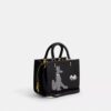 Bolso Disney X Coach Rogue 25 con Pluto
