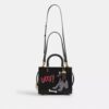 Bolso Disney X Coach Rogue 25 con Pluto
