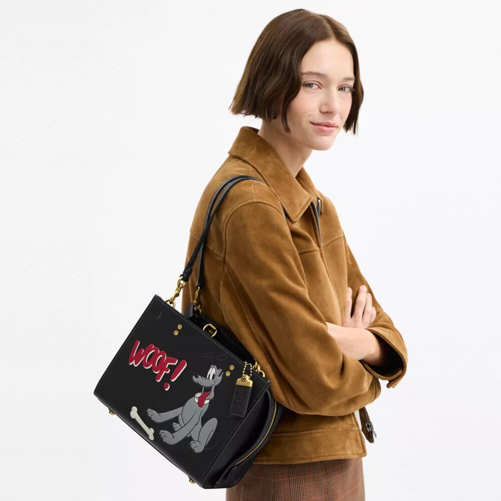 Bolso Disney X Coach Rogue 25 con Pluto