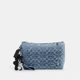 Bolso en el característico denim «Loved» con Charms