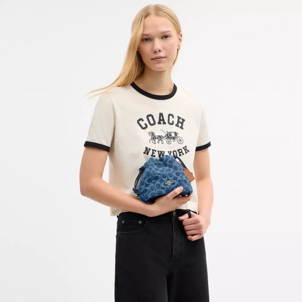 Bolso Faye Mini con cordón en denim exclusivo