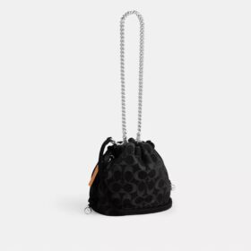 Bolso Faye Mini con cordón en denim exclusivo