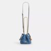 Bolso Faye Mini con cordón en denim exclusivo