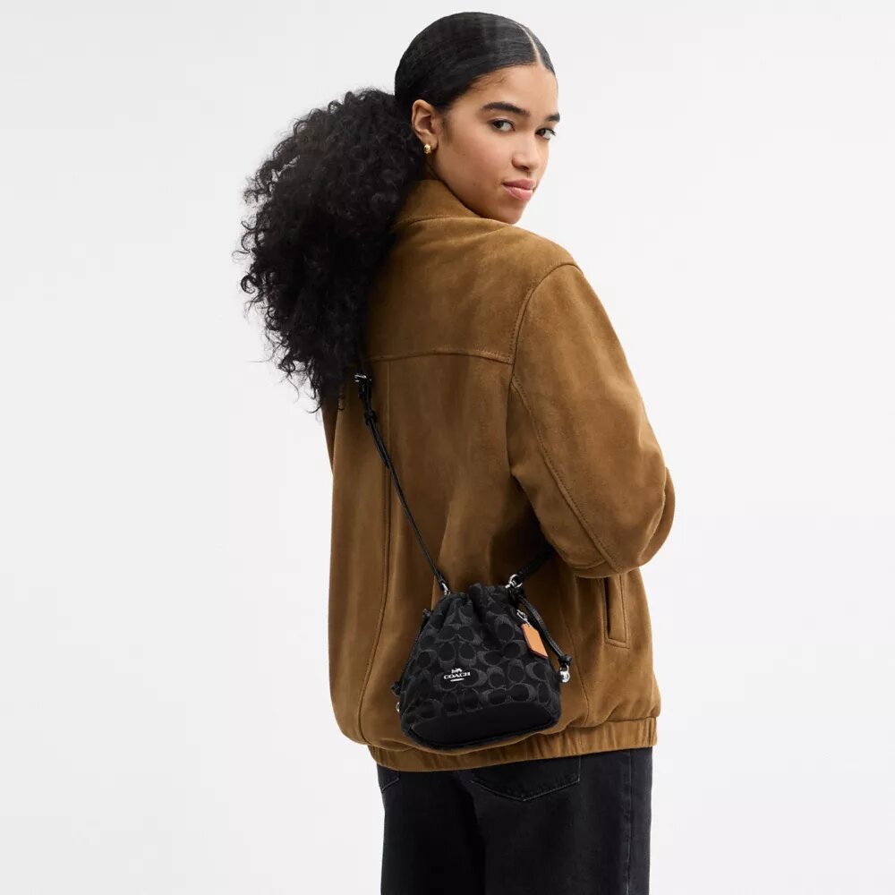 Bolso Faye Mini con cordón en denim exclusivo