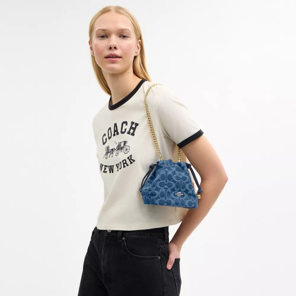 Bolso Faye Mini con cordón en denim exclusivo
