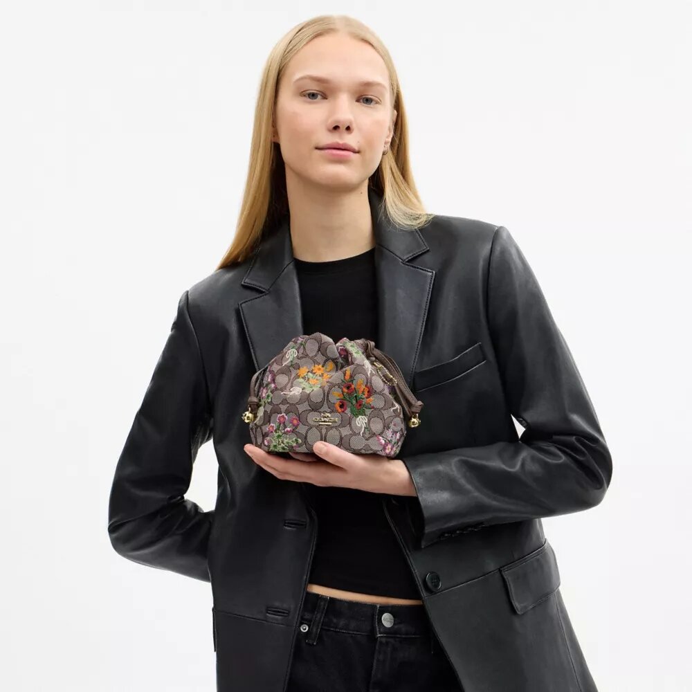 Bolso Faye Mini con cordón en jacquard exclusivo y bordado floral