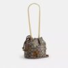 Bolso Faye Mini con cordón en jacquard exclusivo y bordado floral