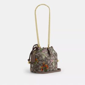 Bolso Faye Mini con cordón en jacquard exclusivo y bordado floral