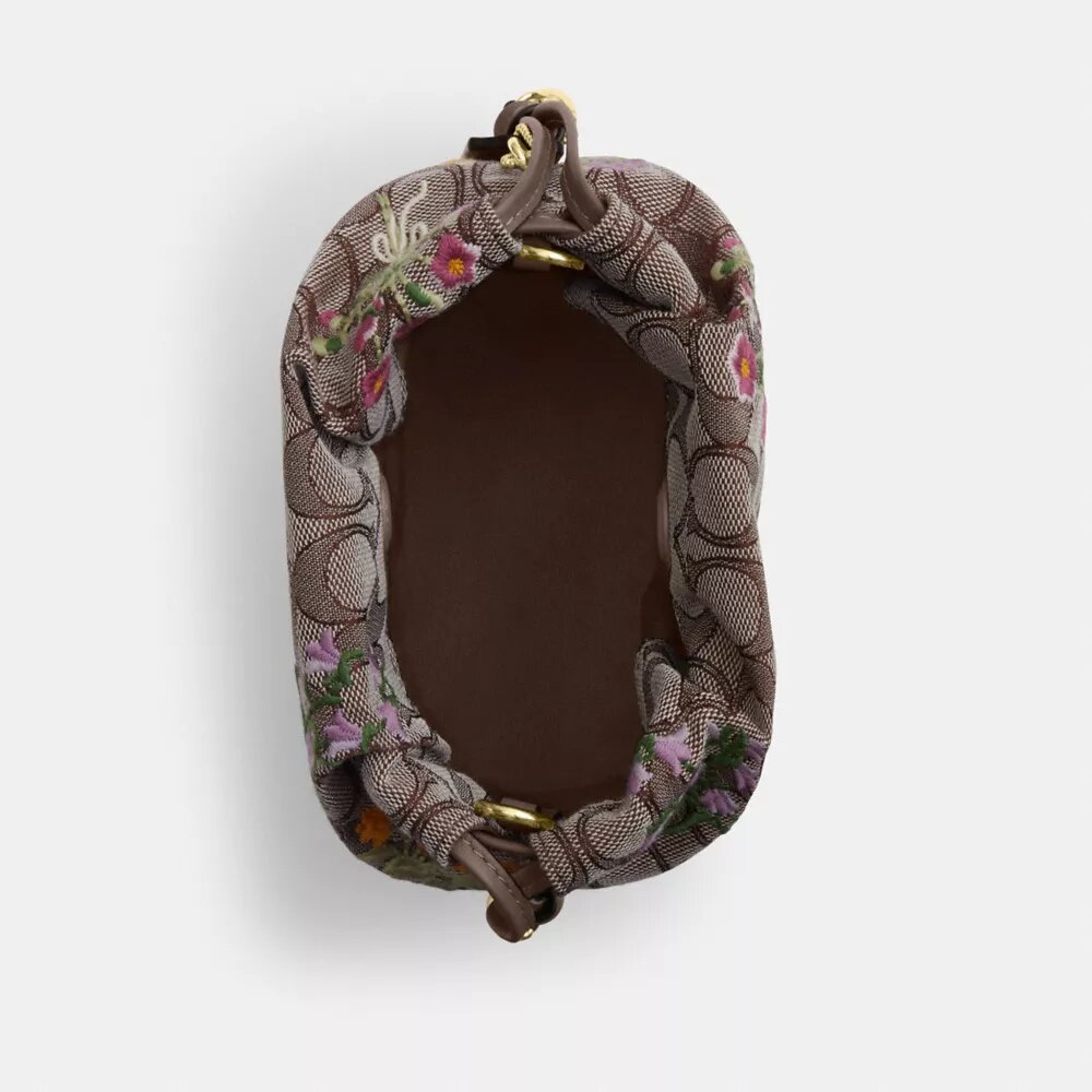 Bolso Faye Mini con cordón en jacquard exclusivo y bordado floral
