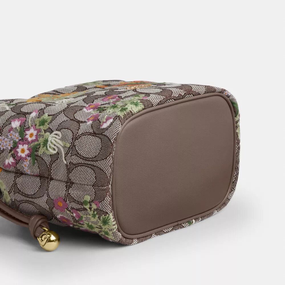 Bolso Faye Mini con cordón en jacquard exclusivo y bordado floral