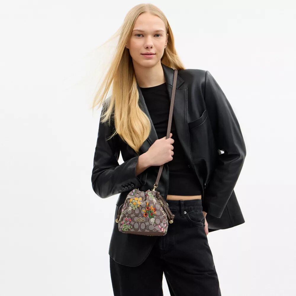 Bolso Faye Mini con cordón en jacquard exclusivo y bordado floral