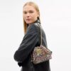 Bolso Faye Mini con cordón en jacquard exclusivo y bordado floral
